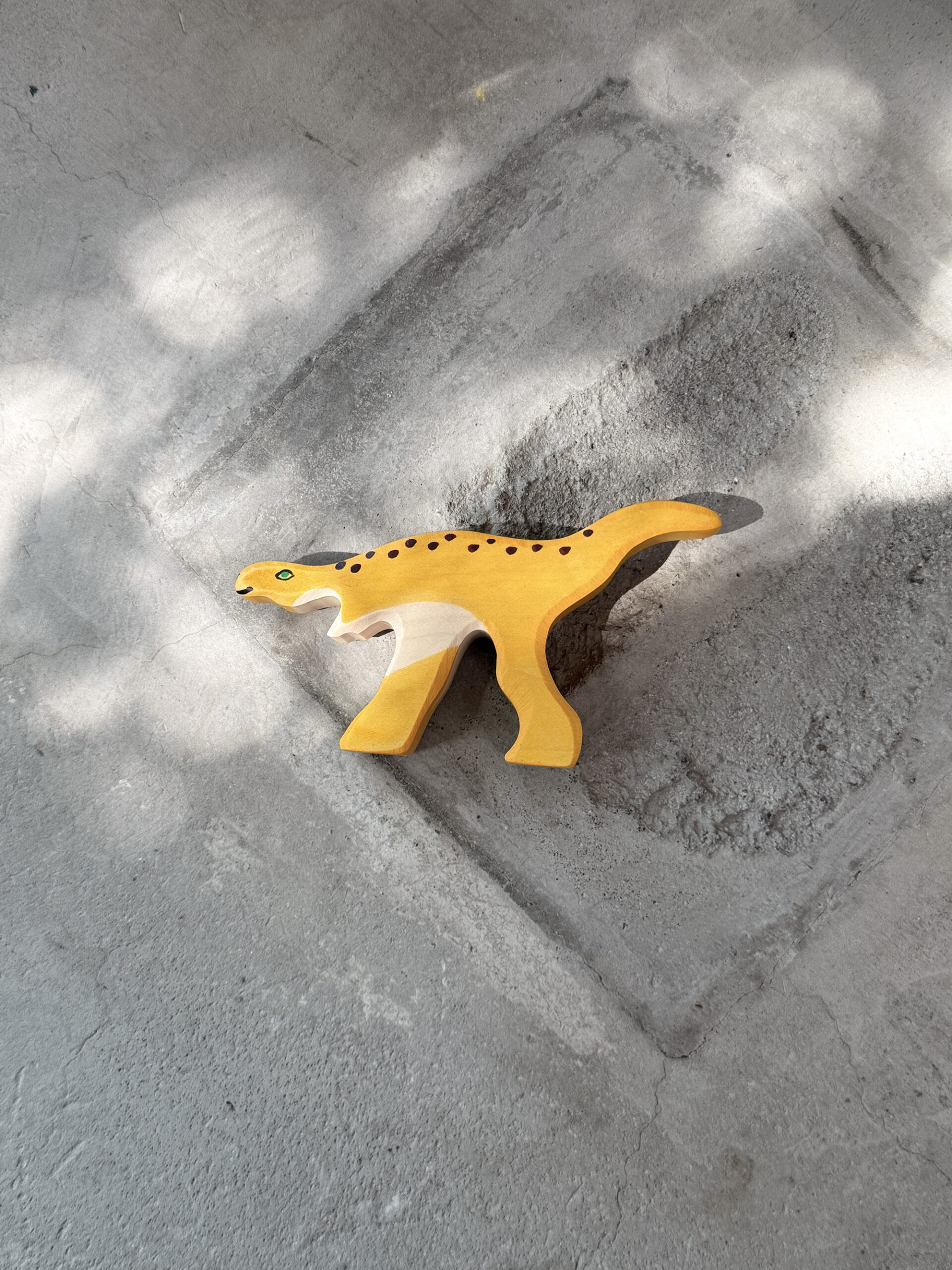 Small wooden dinosaur