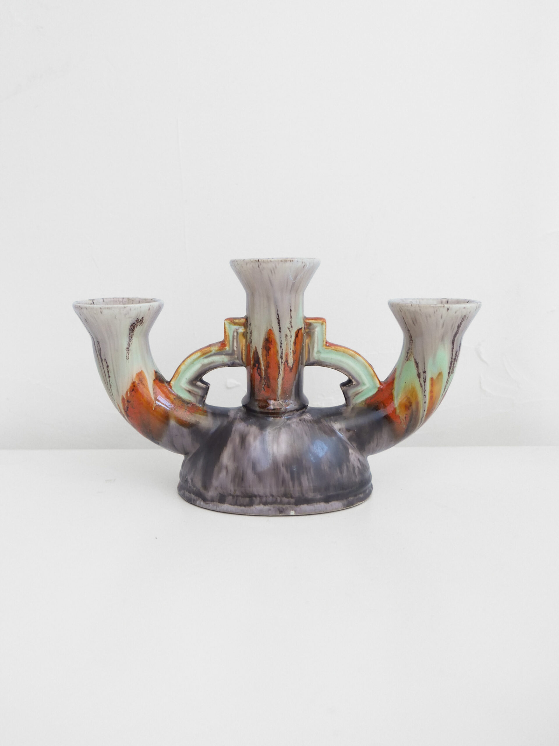 Marbled three-arm candle holder