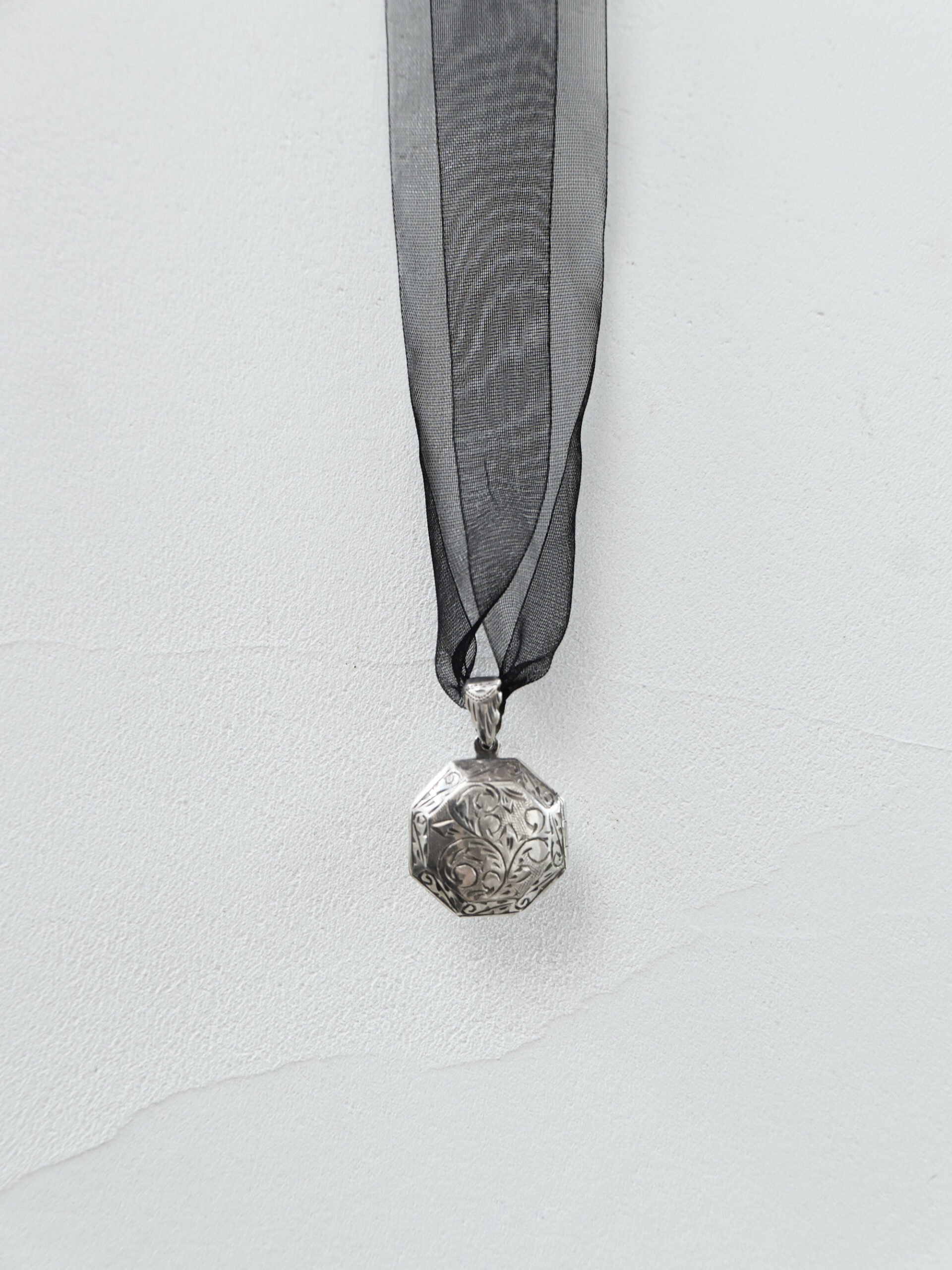 Octagonal floral locket